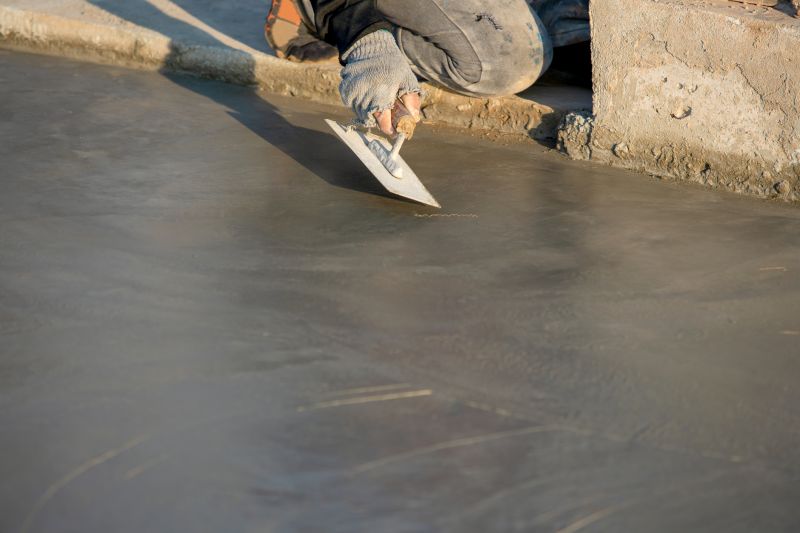 Artisan working on cement surface